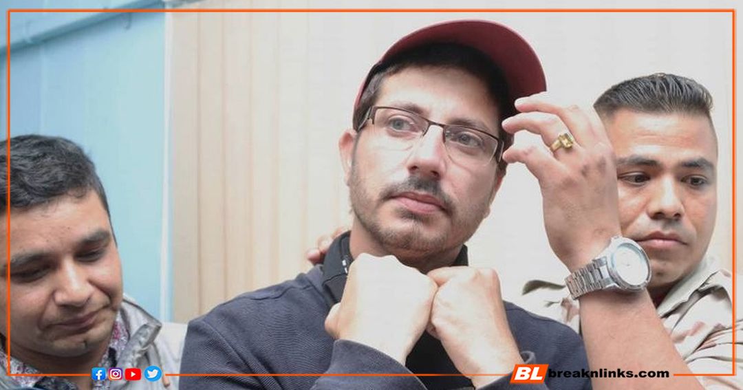 अदालतबाट ठहर भएका मुख्य अपराधी चुणामणि उप्रेति (गाेरे) राताे टाेपीमा